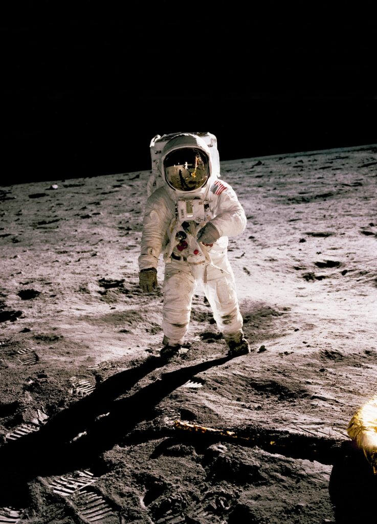 Astronaut Buzz Aldrin walking on the surface of the Moon during the Apollo 11 mission.